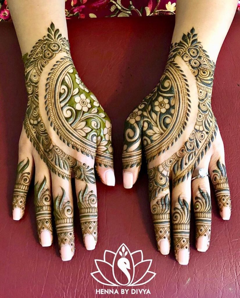 beautiful arabic mehndi design on back of the hand